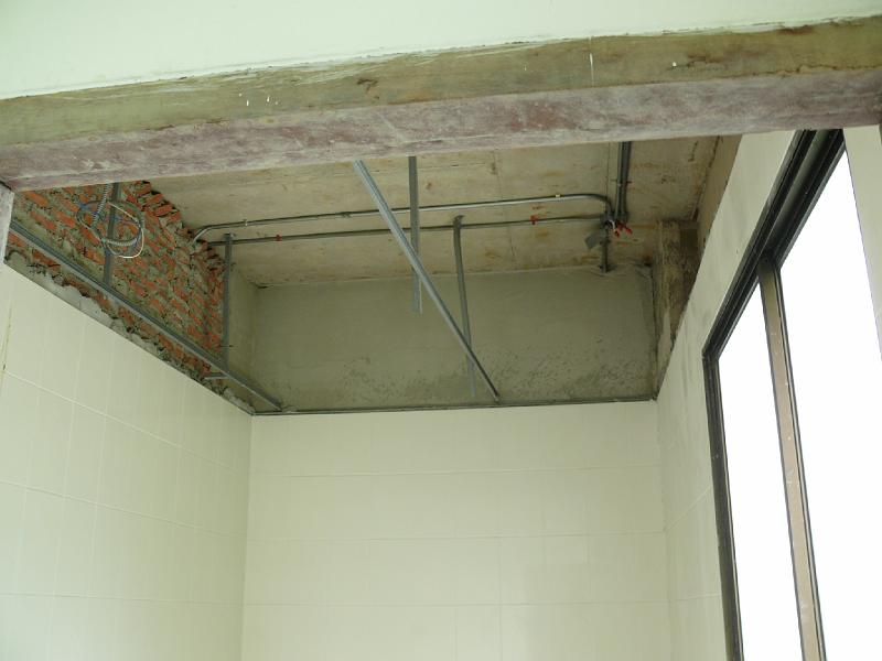 ceiling_P1000061.JPG - Revealing more of the overhead space.

It looks like we will win back 18-24" once the false ceiling is removed. This will make the ceiling fans less of an intrusion into the living space.