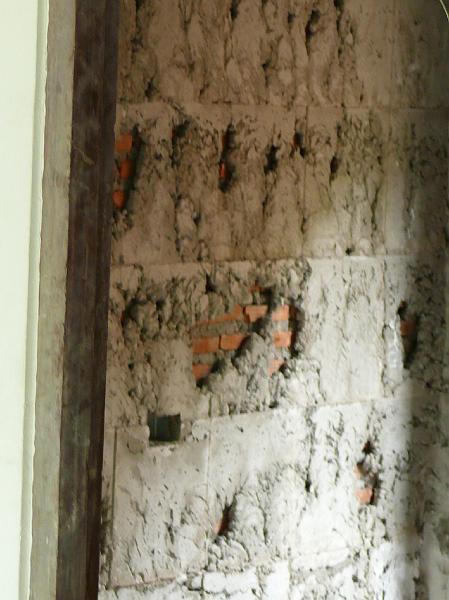 P1000236.JPG - The tile is coming off in the kitchen...