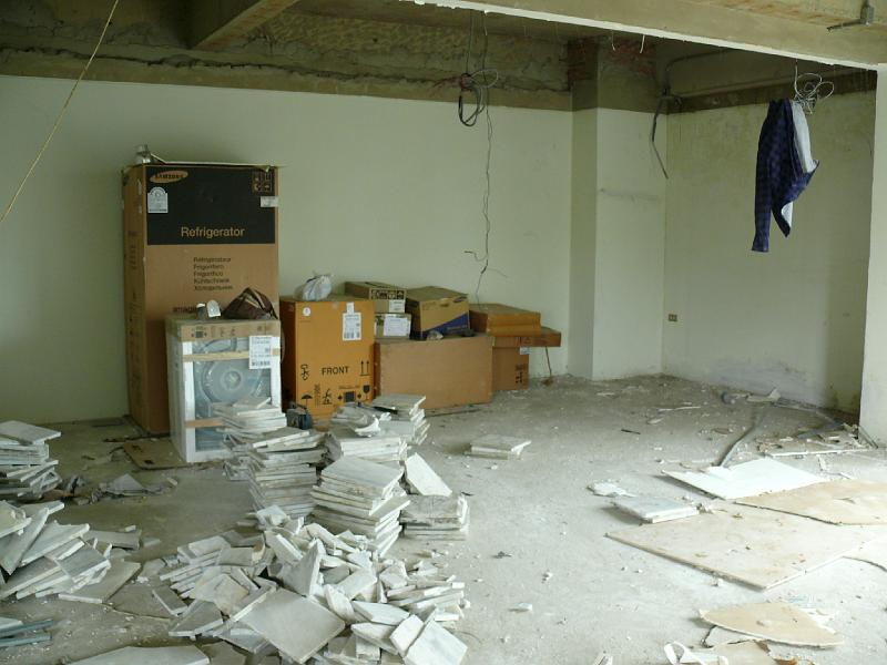 P1000240.JPG - Debris and removed tiles.