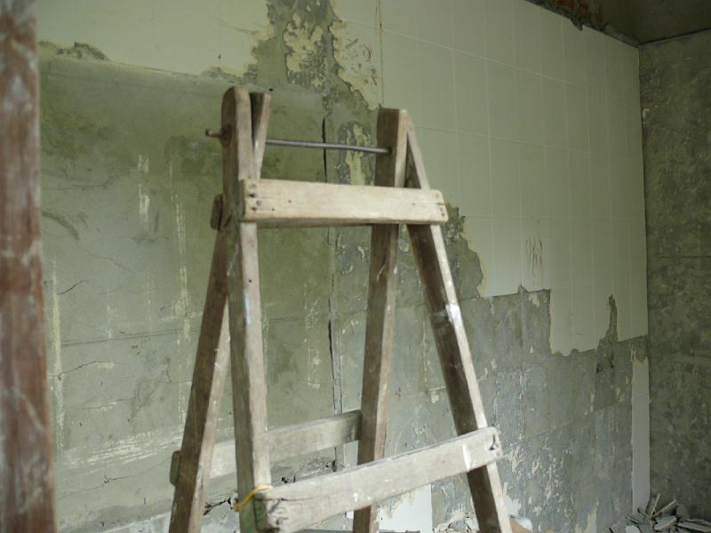 P1000250.JPG - The wall tile has been removed in the guest bath/laundry area.