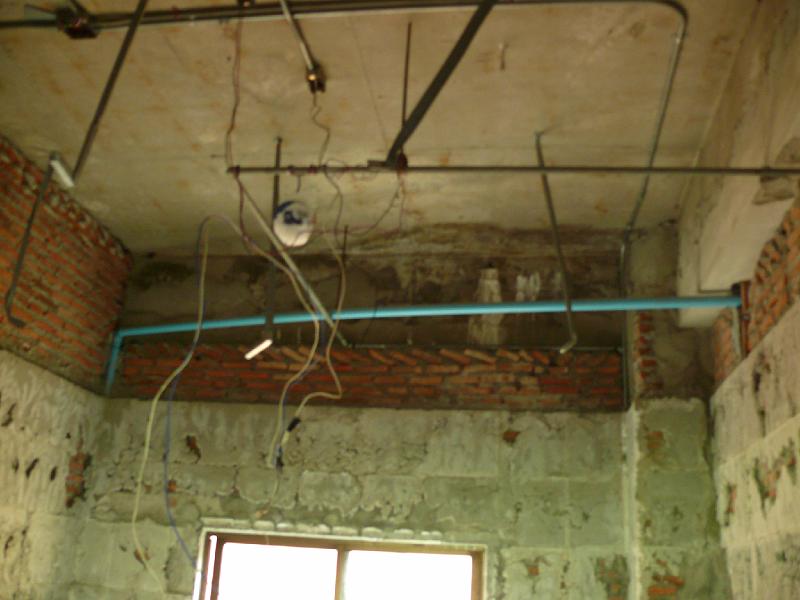P1000254.JPG - The kitchen ceiling. Jon plans to add opaque glass and replace the existing generic window.