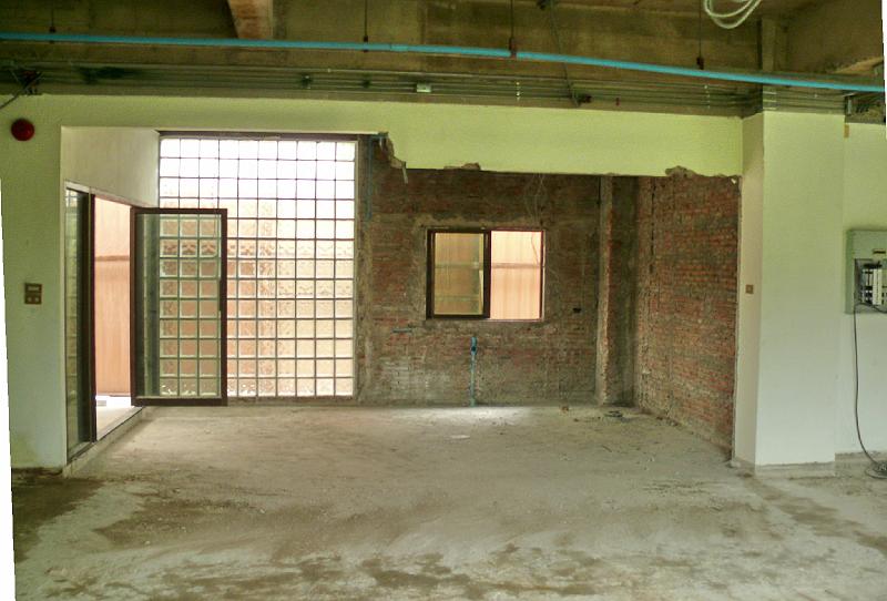 P1000279.JPG - This perspective should better establish where the wall was removed between the glass brick entry area and the kitchen. The glass brick will be replaced by a series of vertical milky glass panels.