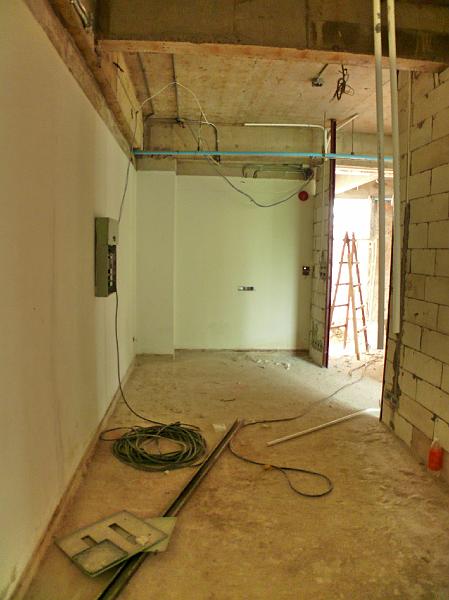 P1000301.JPG - Jon's office as seen from the utility closet area. (The wall for the utility closet has not yet been constructed.)