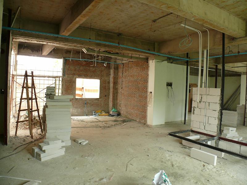 P1000307.JPG - What was the left wall of the original kitchen area has been removed. This opens up the kitchen and dining area considerably. The opening in the center of the kitchen wall will be closed up shortly.