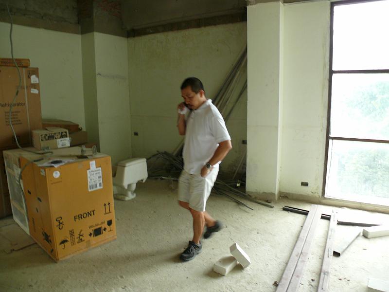 P1000318.JPG - The master bedroom area. There will be a cabinet and plasma TV forming a casual boundary between my work area and the bedroom.