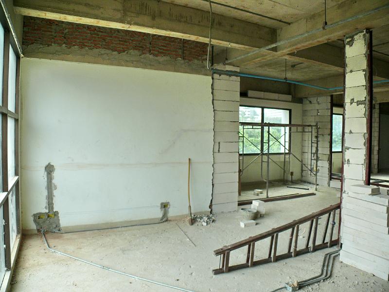 P1000320.JPG - When we're not hosting guests, sliding doors will open the area between my workspace and the guest room (to the right).