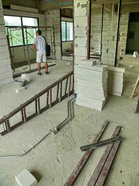 P1000328.JPG - Jon inspects the guest bedroom. (As seen from the master bedroom.)
