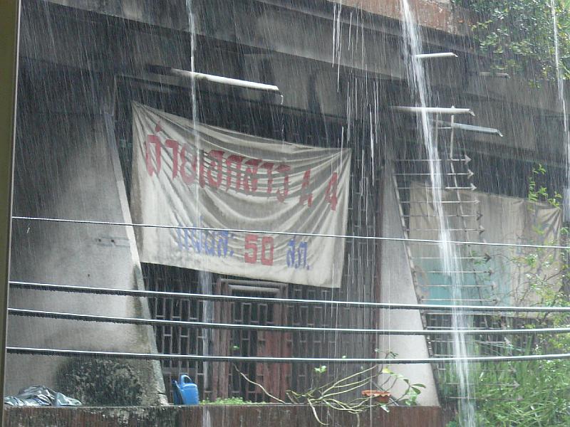 P1000340.JPG - It's rainy season. Most of the time since I arrived there have been fast moving local showers. You stand in the entryway to a building and watch as the rain peters out. But for the last few days there have been generally grey skeys and downpours that just go on and on.