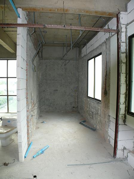 P1000359.JPG - The wall on the left was extended to provide space for the laundry area. The guest bath will be just beyond (where the window is located).