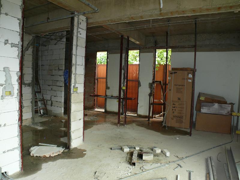 P1000361.JPG - This is the master suite area. The old bathroom wall has been removed and holes have been cut for translucent glass sheeting inserts. (The glass will be installed within the next week or two.)