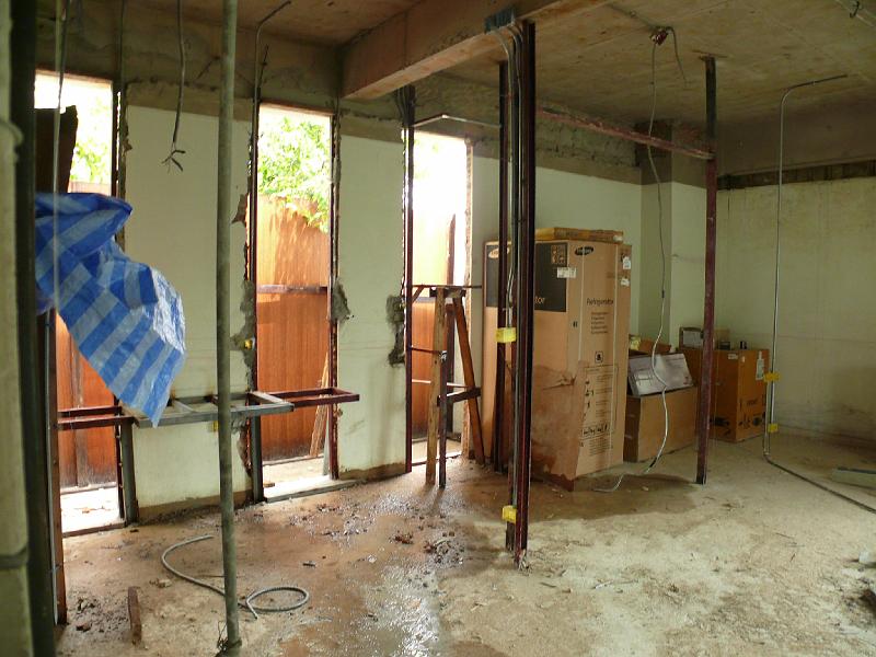 P1000375.JPG - The vertical in the center of this photo will become part of the master bedroom wall. (The appliances are stacked up in the master bedroom.)