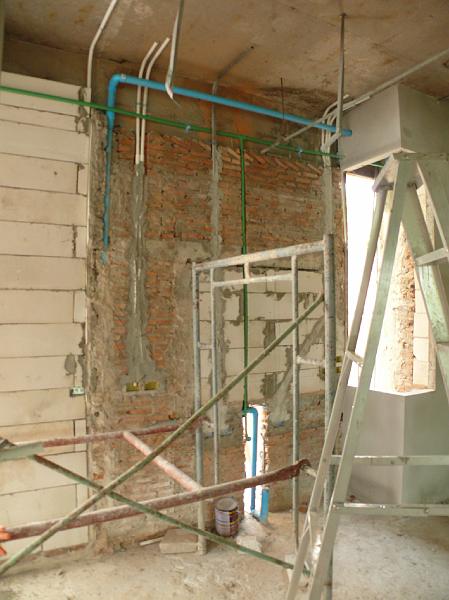 P1000420.JPG - The internal plumbing is largely in place, allowing dry wall work to proceed in the next week.