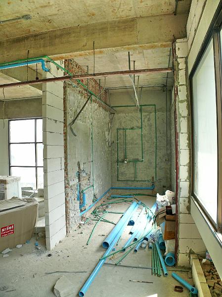 P1000449.JPG - The guest bath/laundry. The interior plumbing is in place.