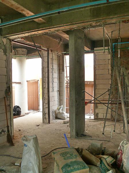 P1000464.jpg - The vertical element in the center is one demonstration of how Jon is opening up the space. That was once the corner wall enclosing the intended kitchen.