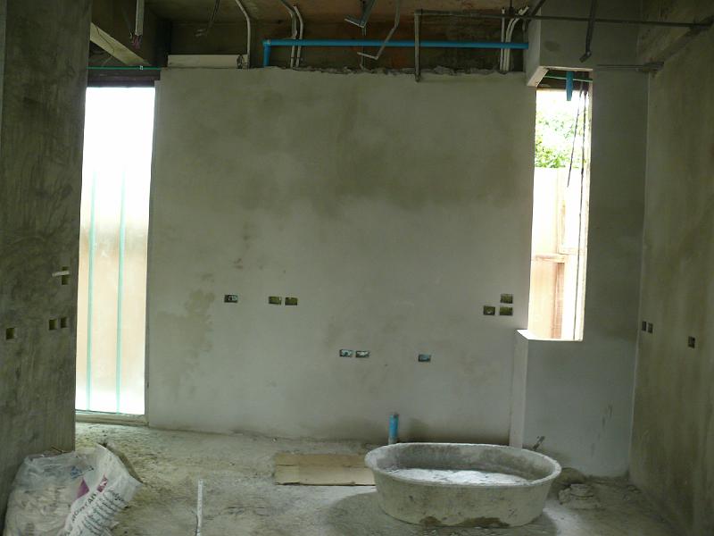 P1000474.JPG - The kitchen will be an open segment of the main living/entertainment area. With my back to this central wall, I will be preparing ingredients on a floating island. And I'll have an unobstructed view of the flat panel TV. (The primary interior living room wall is on the left off the edge of this photo.)