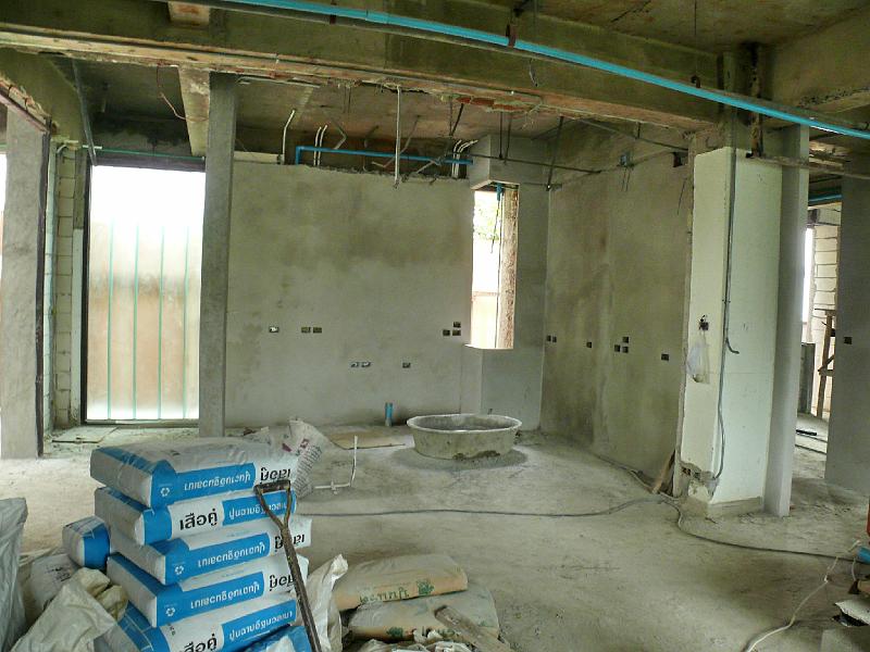 P1000477.JPG - (Closer view of kitchen area) This plastering work will be continuing throughout the apartment for the next two or three work days.