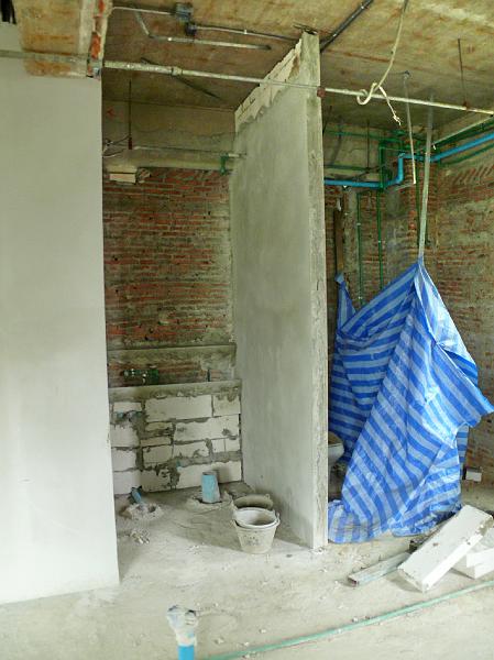 P1000483.jpg - Another view of the half bath area (to the left). Background walls for half- and master bath await plastering.