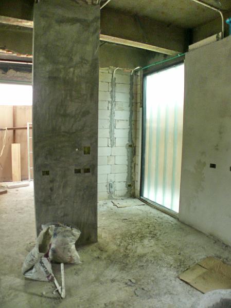 P1000487.jpg - A view from the kitchen area looking out toward the entrance.