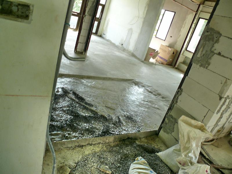 P1000496.JPG - The concrete was just poured yesterday. This area is still wet.