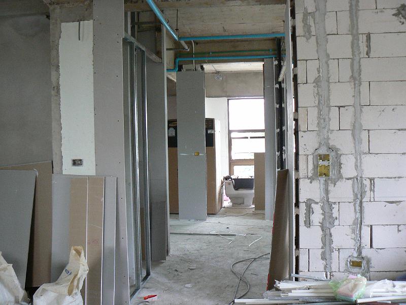 P1010955.JPG - The hint of a hallway is slowly emerging.