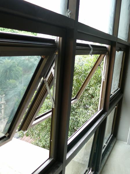 P1000542.JPG - Casement window frames are now in place on the east wall (my work area and part of the master bedroom).