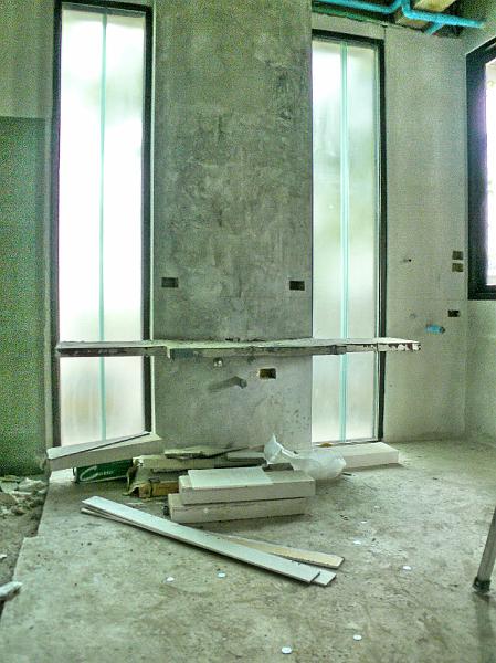 P1000551.jpg - The master bath countertop stand has been added.