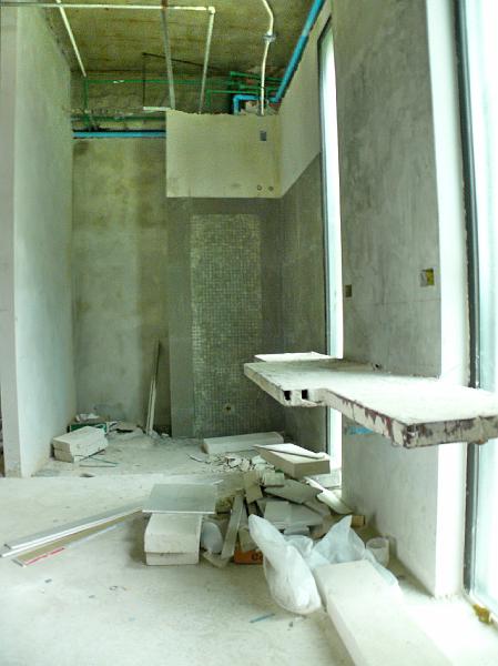 P1000554.jpg - Looking into part of the master bath from the bedroom's walk-in closet.