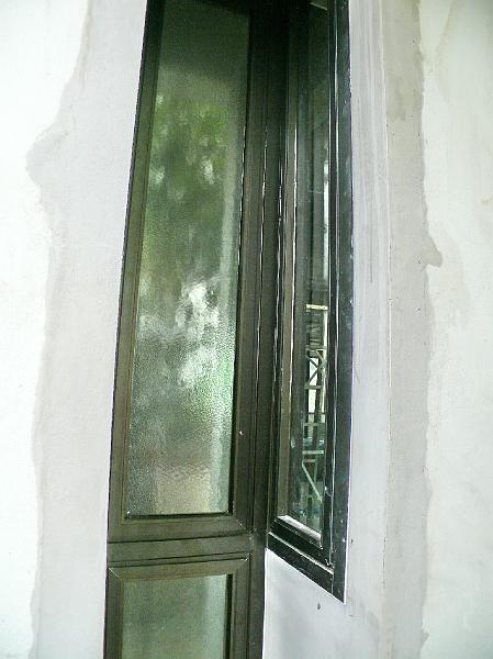 P1000558.jpg - An exterior view of the kitchen casement window niche.