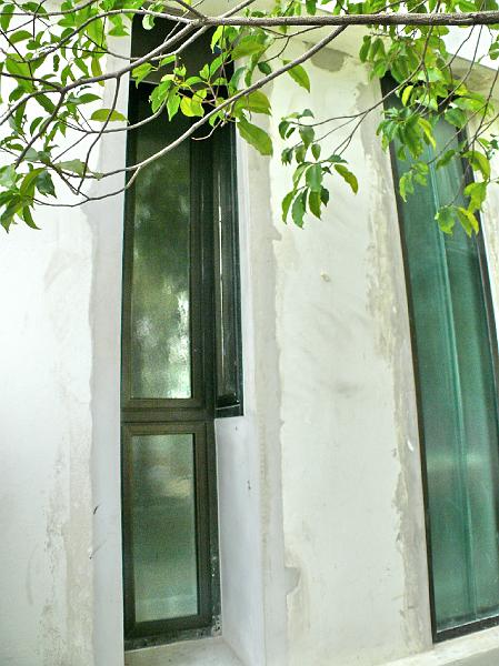 P1000559.jpg - Exterior view of the master bedroom casement window.