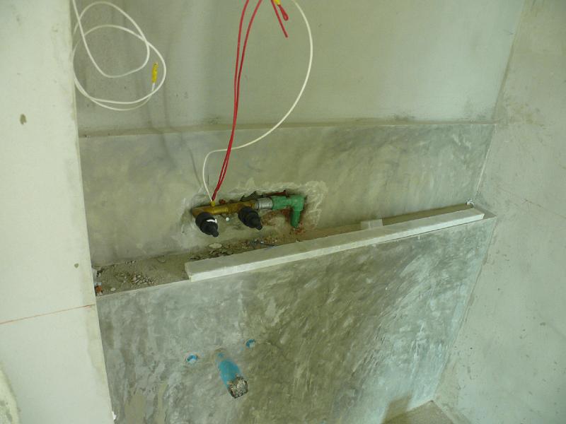 P1000599.JPG - Wires await lighting in the half bath.