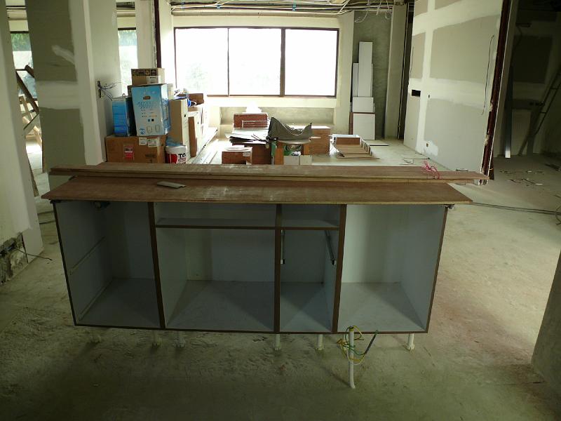 P1000606.JPG - A view of the kitchen island looking into the living room. (The LCD TV will be mounted on the wall on the background right-- so I will be able to watch TV while prepping meals.)