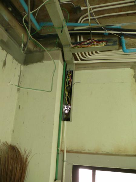 P1000612.JPG - A maze of wires appeared this week in the ceiling of Jon's office.