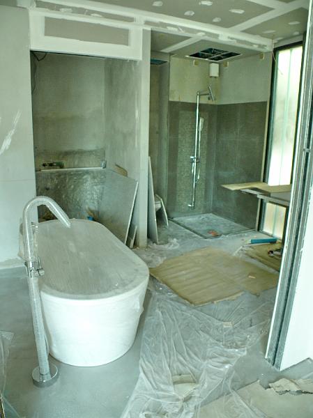 P1000653.jpg - Soon they'll be installing glass with strategic privacy precautions to complete enclosure of the master bath.