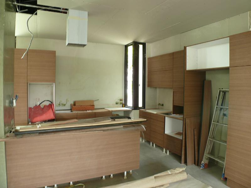 03-P1000665.JPG - Most of the cabinet facing is in place. We're waiting for delivery of the countertop any day now.