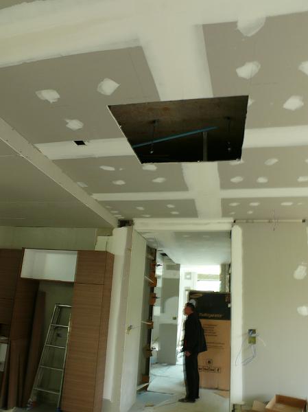 P1000681.JPG - The ceiling mounted air conditioning unit will be placed in this cutout between the kitchen and living room.