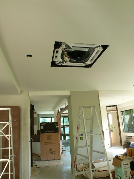 P1000802.JPG - The ceiling air conditioning unit has been embedded in the living room/kitchen space.