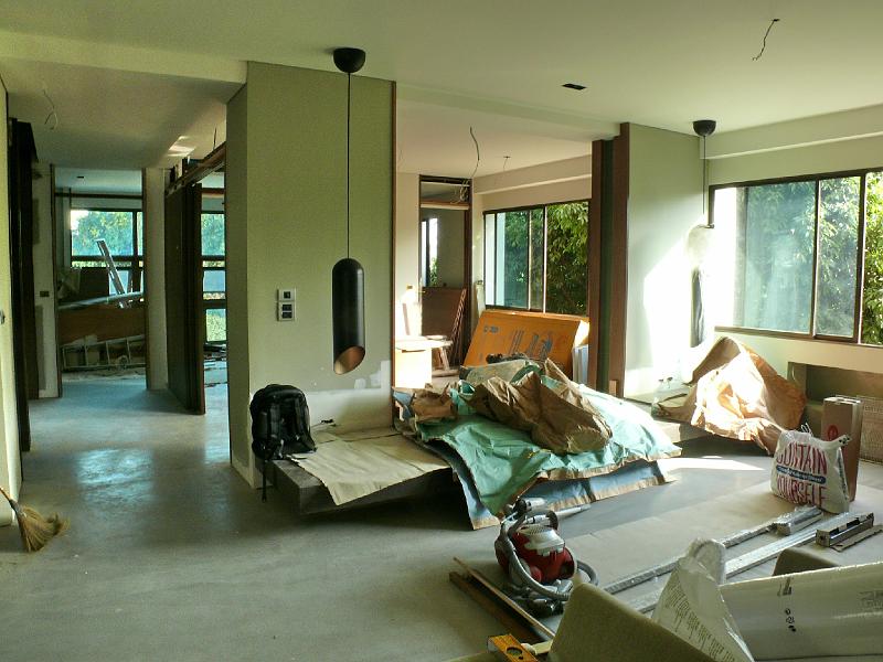 P1000812.jpg - The living room is now graced by the English-designed pendant lights on either side of what will be the seating area. The granite foundation is already in place and cushions are coming after the finishing touches are done in the apartment.