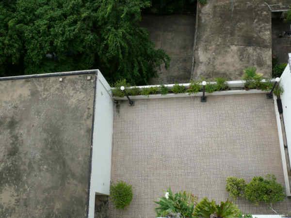 P1000021-patio.jpg - A fuller view of the western patio space with a bit of the entrance visible on the lower left.