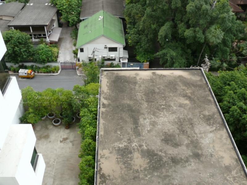 P1000025.JPG - A view of neighboring properties just across the soi from us.