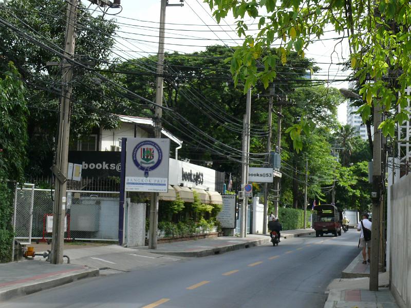 P1000112.JPG - Moving north along Soi 53. On the left side of the street is an English language bookshop.
