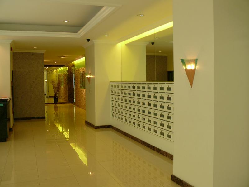 P1000097.JPG - To the right of the receptionist's area are the mailboxes. Upper right is the elevator lobby.